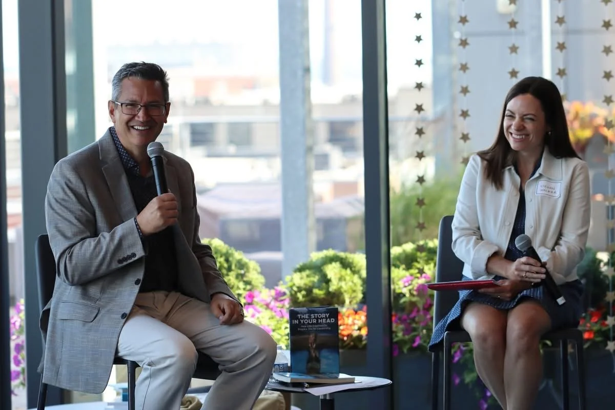 Bob answering questions presented by Megan Walker the emcee of the event.