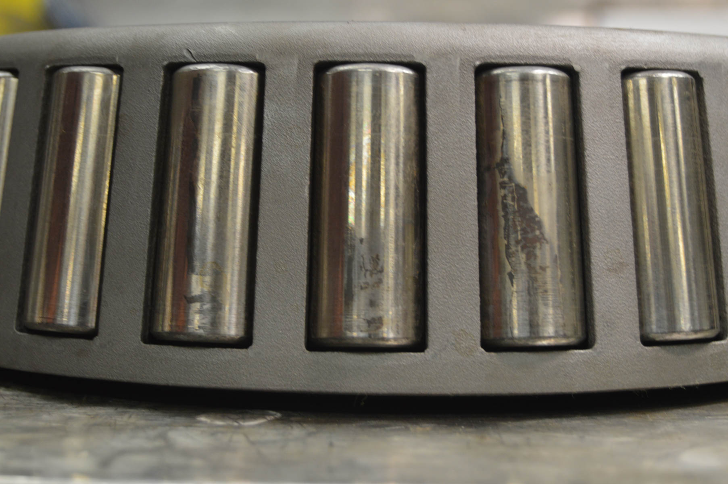 Close-up of a fan or vent with multiple metal blades or slats.