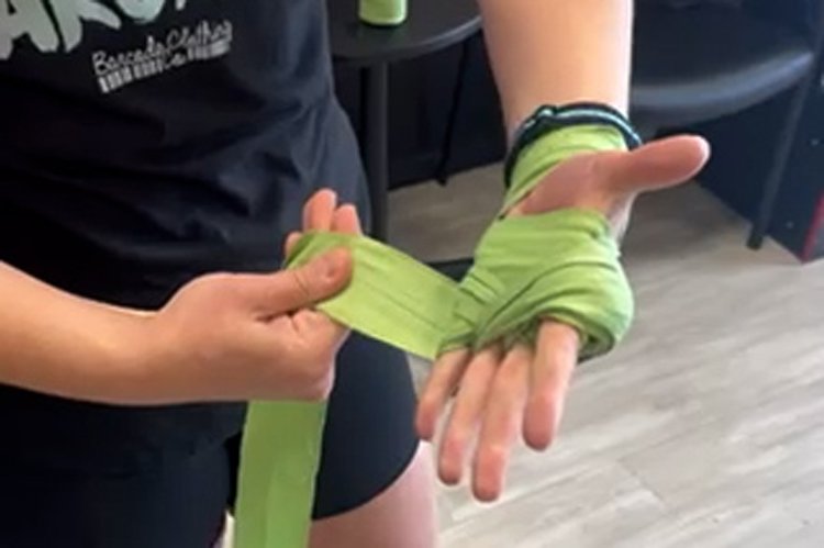 How to Wrap Your Hands For a Boxing HIIT Workout Class
