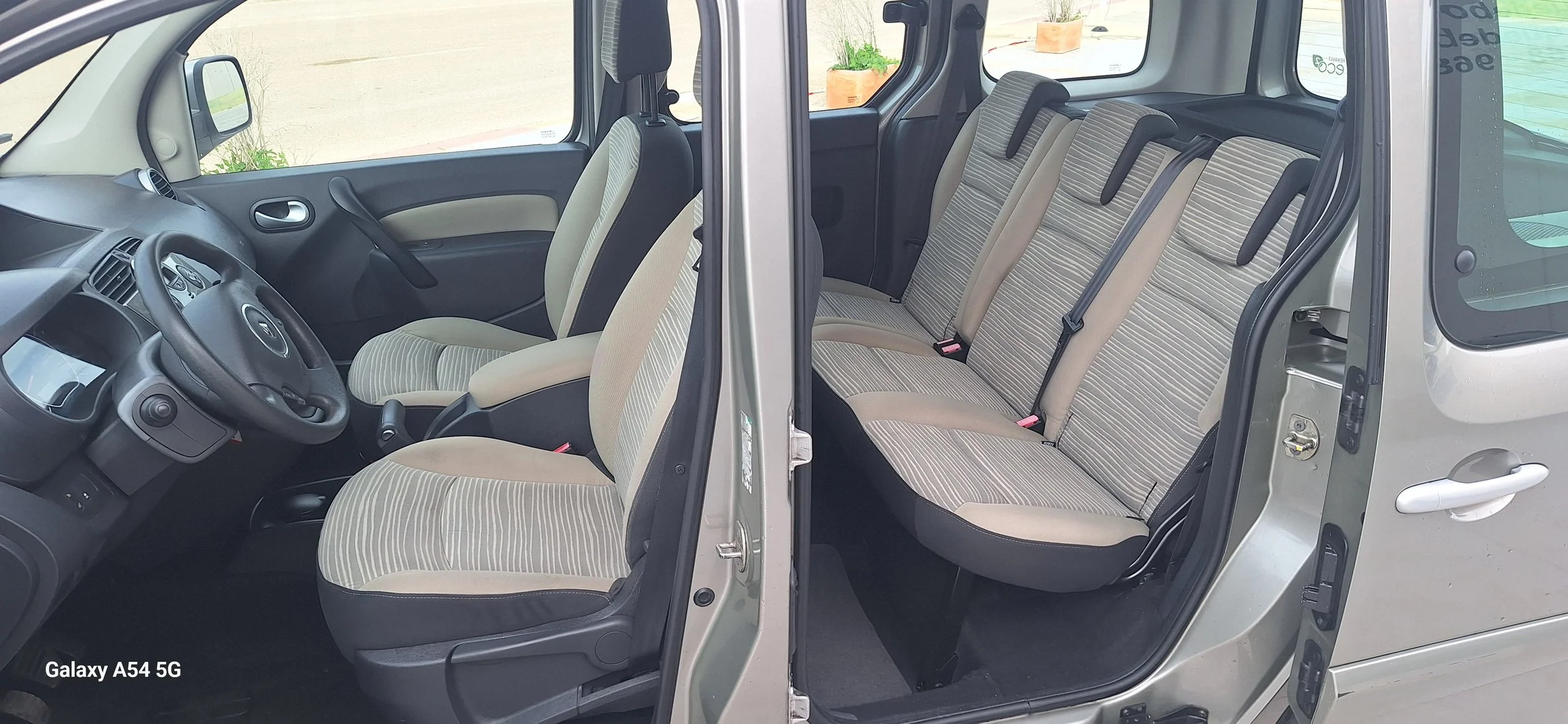 Side-by-side comparison of two vehicle interiors, showing the front seats with the driver's side on the left and the rear seats on the right. The vehicle on the left has two front seats, a dashboard, and a steering wheel, while the vehicle on the right has a back bench seat with three headrests.
