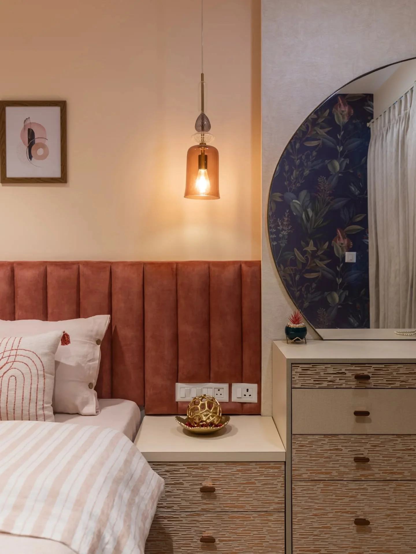 Each room here speaks a different design language &mdash; yet they all rhyme. The black-and-white bedroom balances geometry with calm curves, the navy one wraps itself in quiet depth, and the peach-toned suite glows with gentle warmth. Together, they