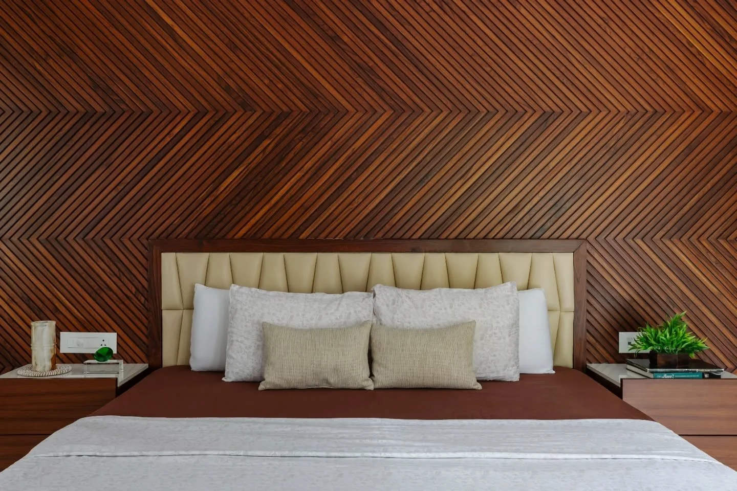 This house doesn&rsquo;t perform. It settles. White walls hold the light gently, wood adds warmth without insistence, and every room opens itself to green views beyond. Powder blues soften private corners, while expansive living and dining spaces bre