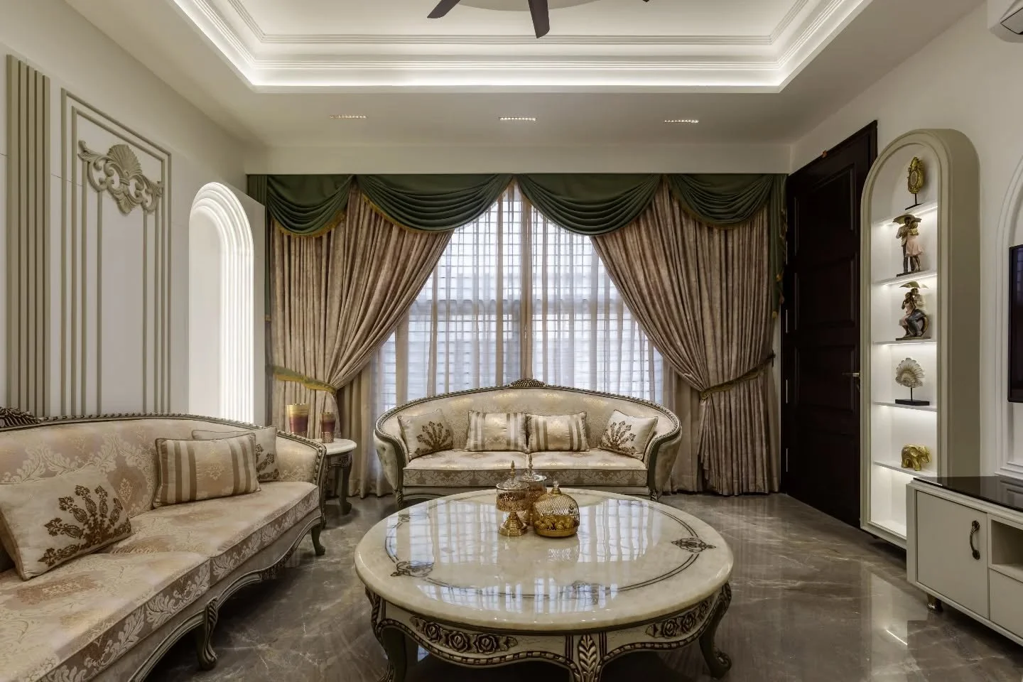 This home is designed around traditions, then polished for modern living. Gold accents catch the light, crown beds command attention, leather and velvet soften the edges, and intricate detailing rewards a second glance. From the facade to the furthes