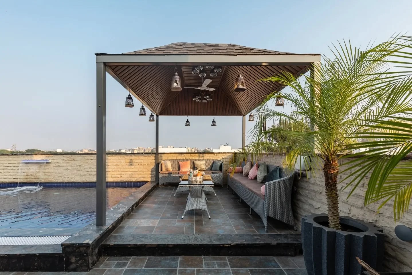 Forget the formalities&mdash;this is where the house loosens its collar. A generous seating arrangement encourages conversations that stretch late into the night, while the poker table and bar quietly compete for attention. The terrace feels like a h