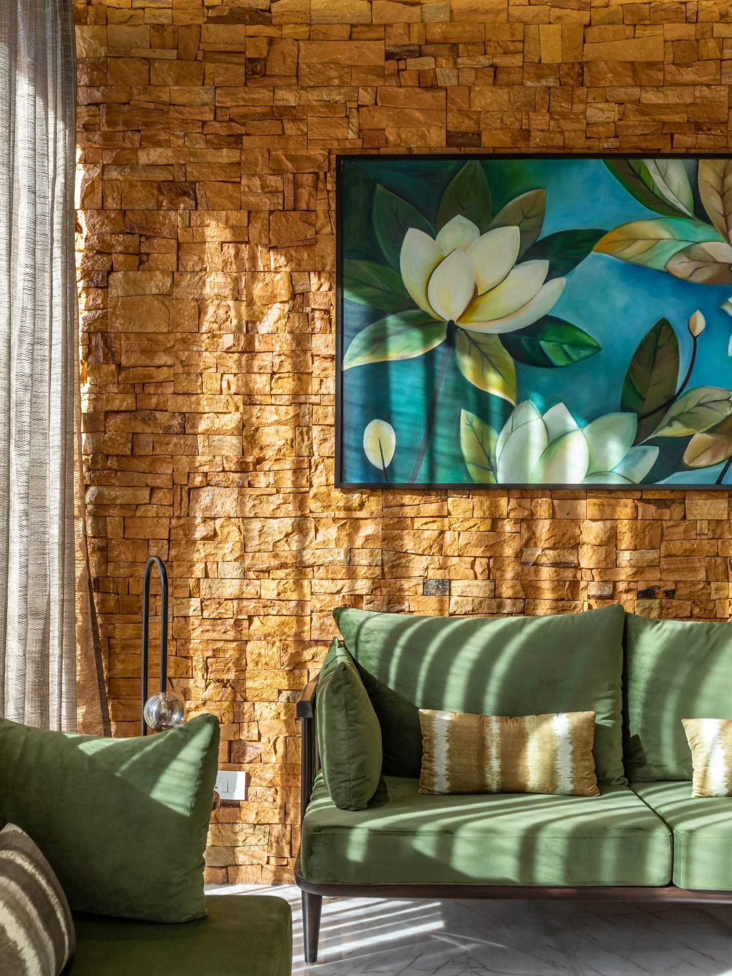 Some houses are built room by room. This one feels assembled through layers of light, stone, wood, and air. Strong geometric volumes establish a contemporary character, while Kota stone threads through the interiors as a quiet reminder of place. Glas