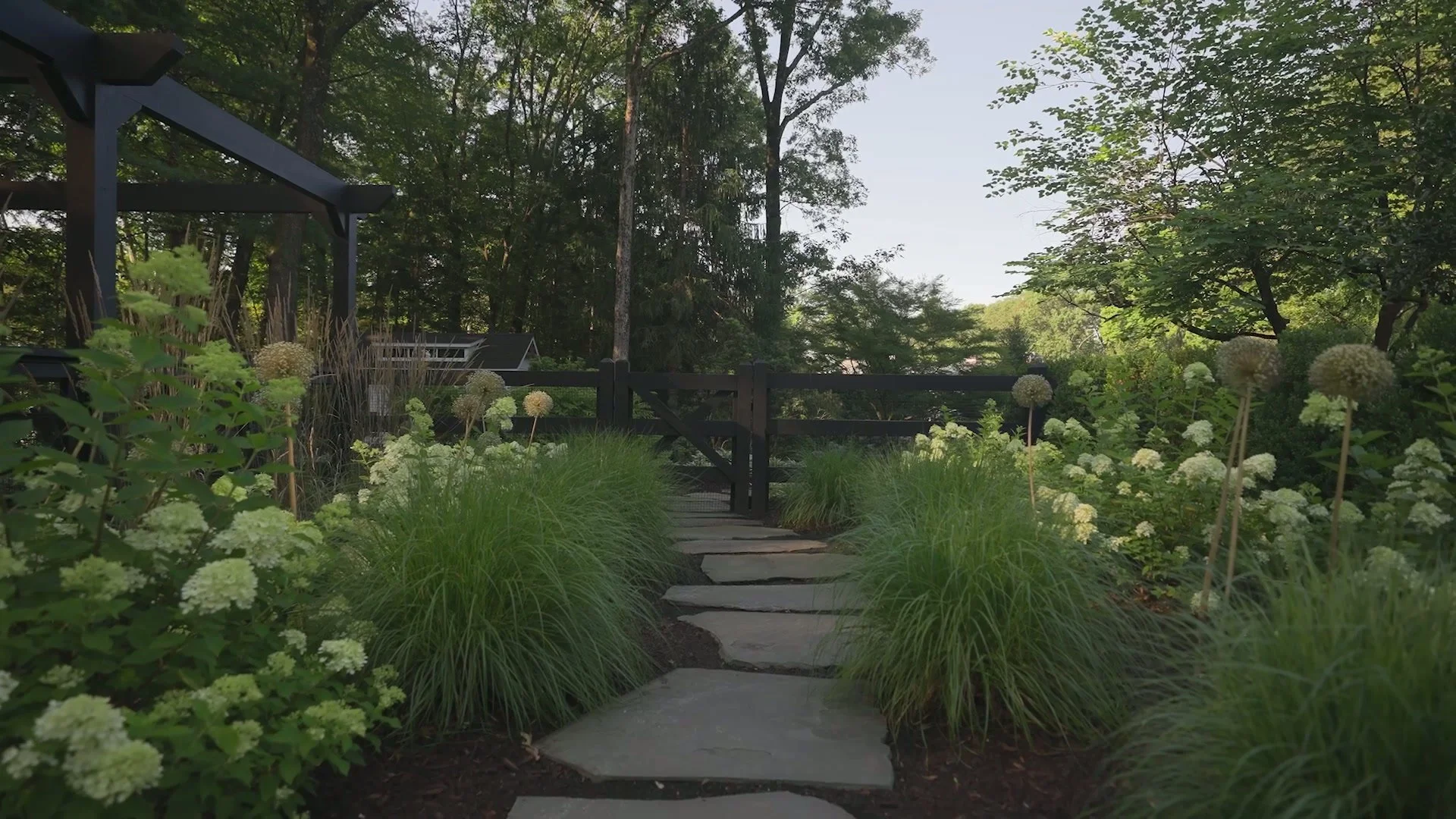Rustic outdoor fireplace creating a warm retreat in Upper Saddle River, NJ