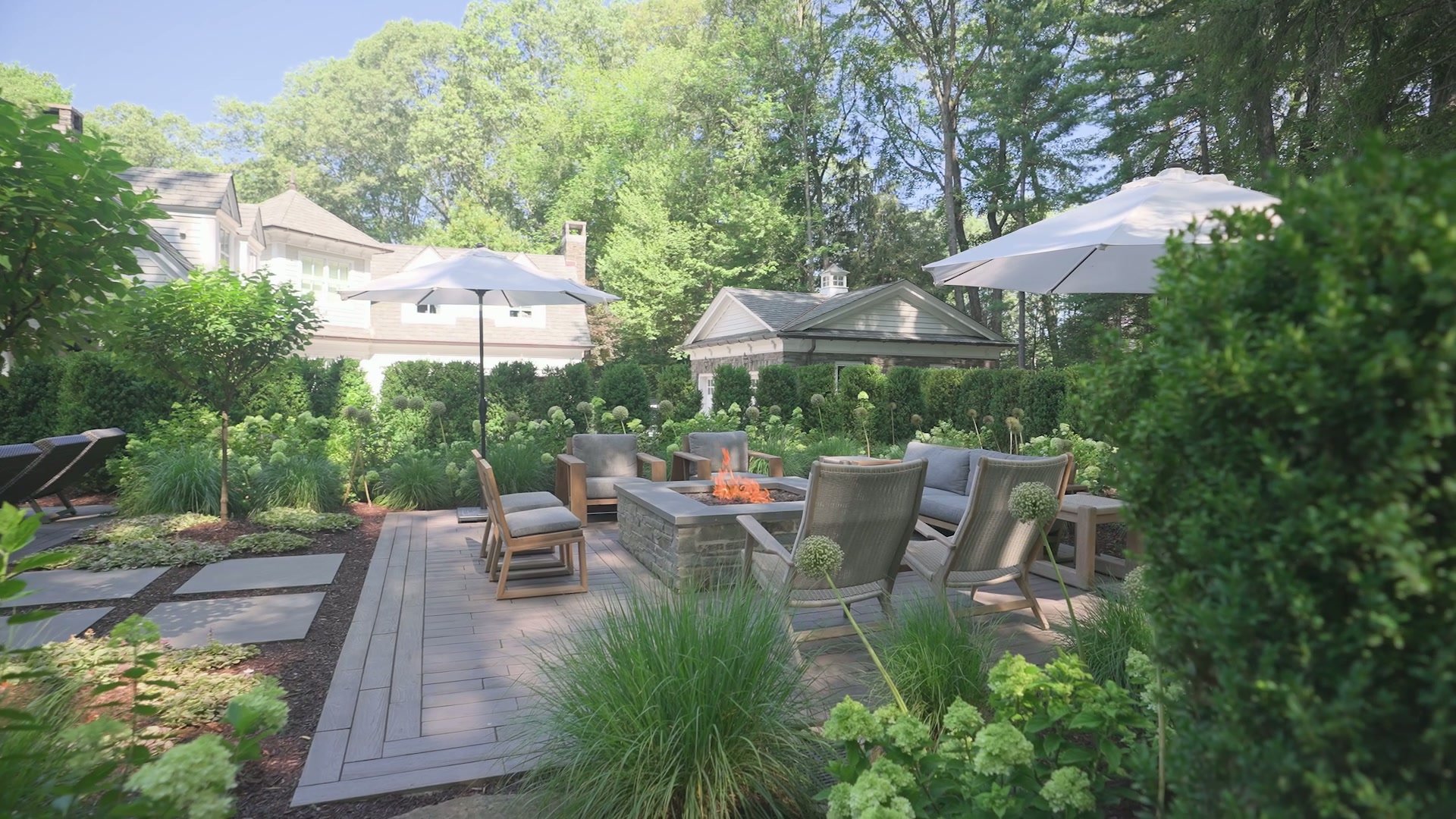 Luxury paver driveway leading to modern home entrance in Ridgewood, NJ