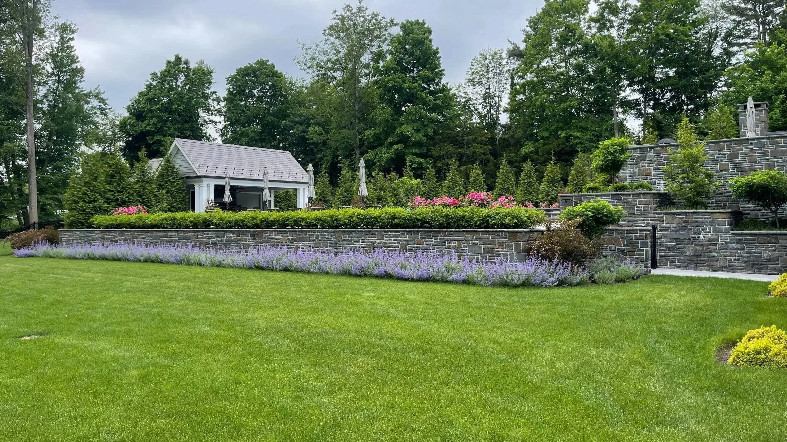 Architectural Outdoor Lighting Highlighting Stone Details in Saddle River, NJ
