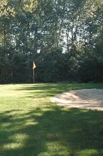 A professionally installed backyard putting green installation integrated into a luxury outdoor living space in Oradell, NJ