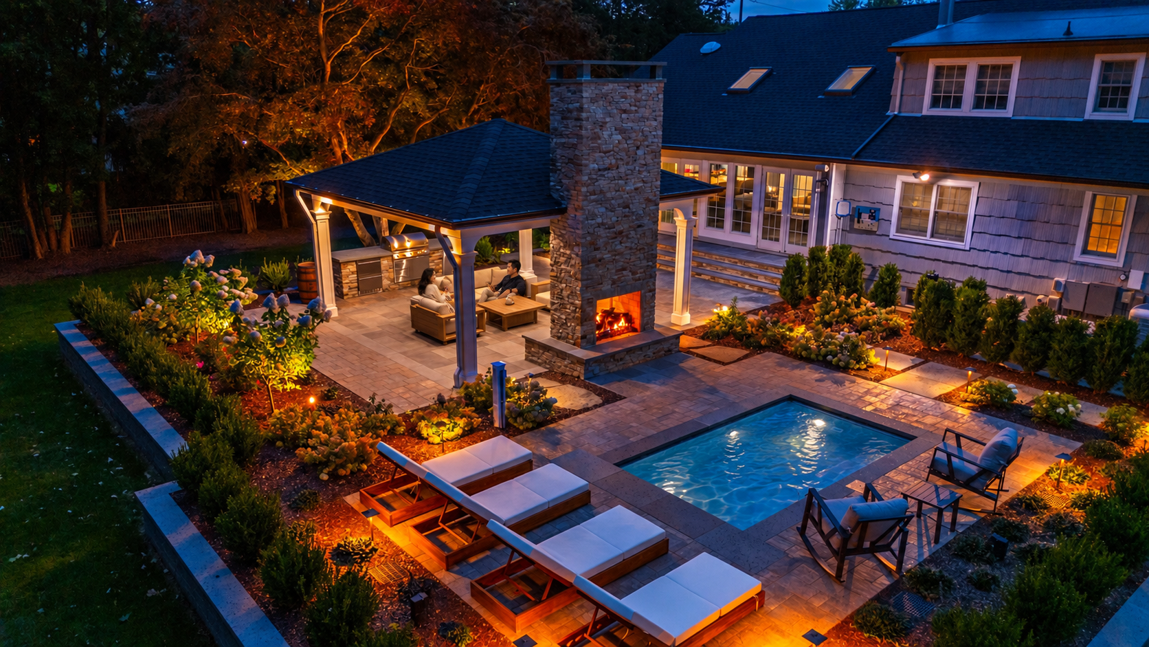 Soake pool by Magic in full outdoor living landscape with pavilion and paver patio