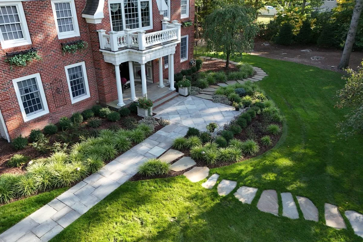 aerial-view-of-bluestone-front-walkway-stepping-stones-and-planted-beds-magic-landscaping.jpg