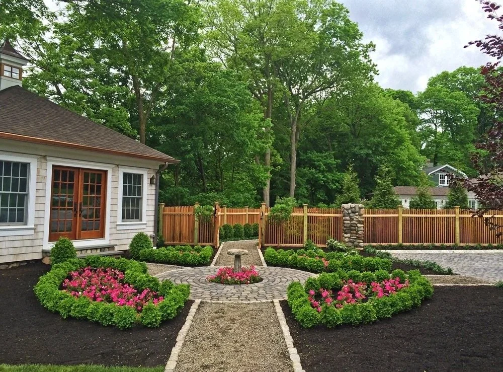 Boxwood parterre garden with stone birdbath centerpiece in Saddle River, NJ.jpeg