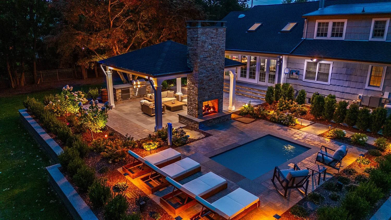 A Relaxing Lounge Area Beside a Plunge Pool and Paver Patio in Upper Saddle River, NJ
