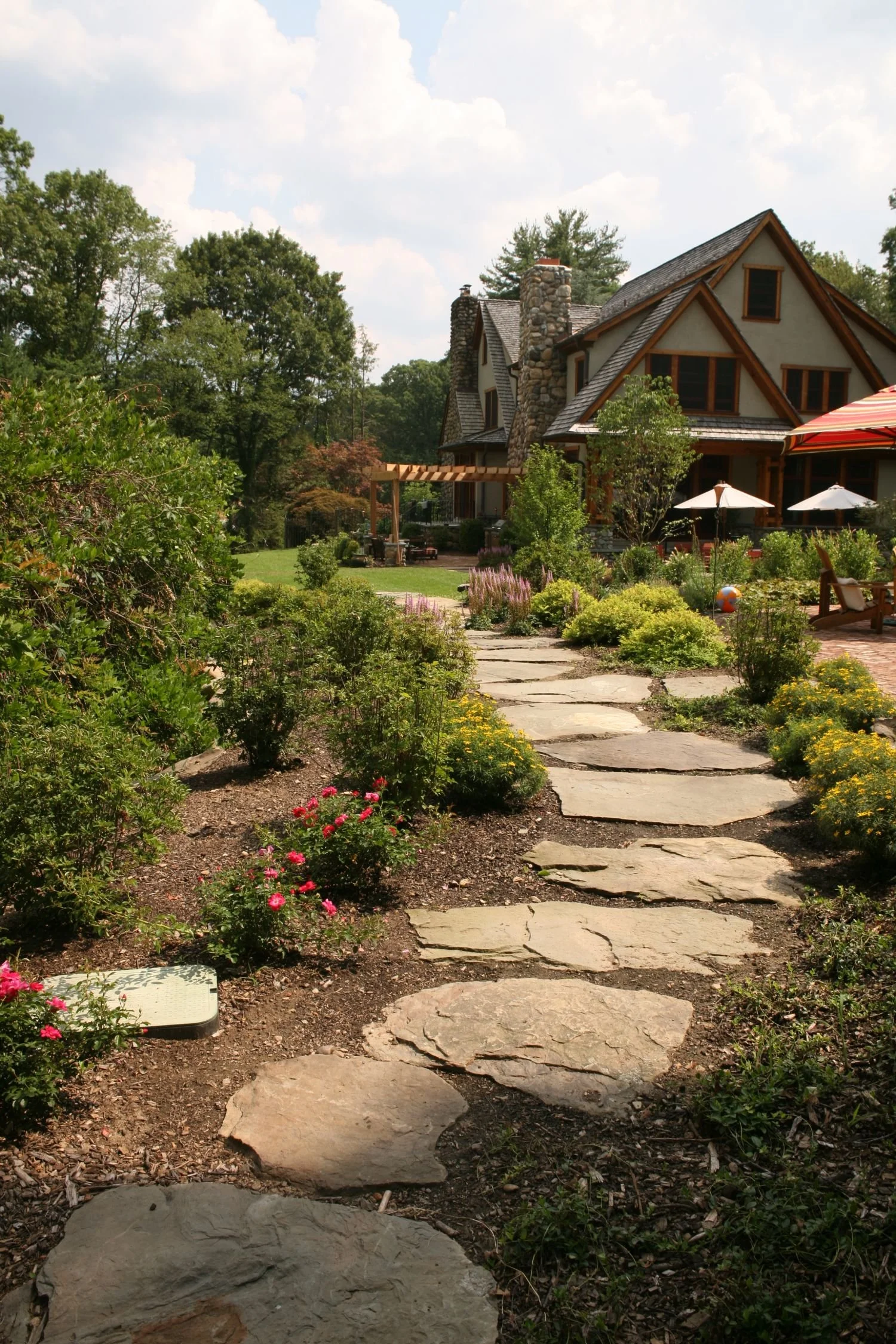 Organic Flagstone Pathway With Boulders and Ferns in Glen Rock, NJ