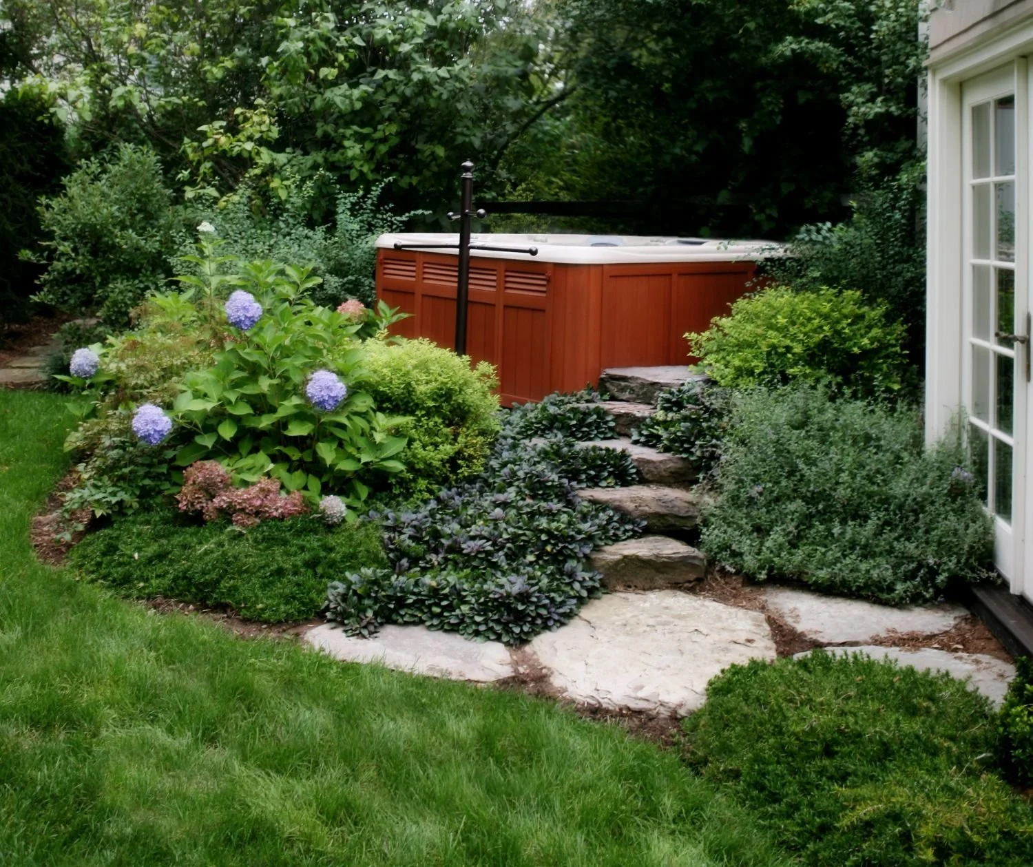 A natural pathway designed to follow the slope of the landscape in Franklin Lakes, NJ