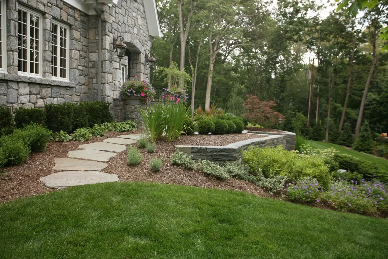 Natural pathway built to soften transitions between lawn and planting zones in Oradell, NJ