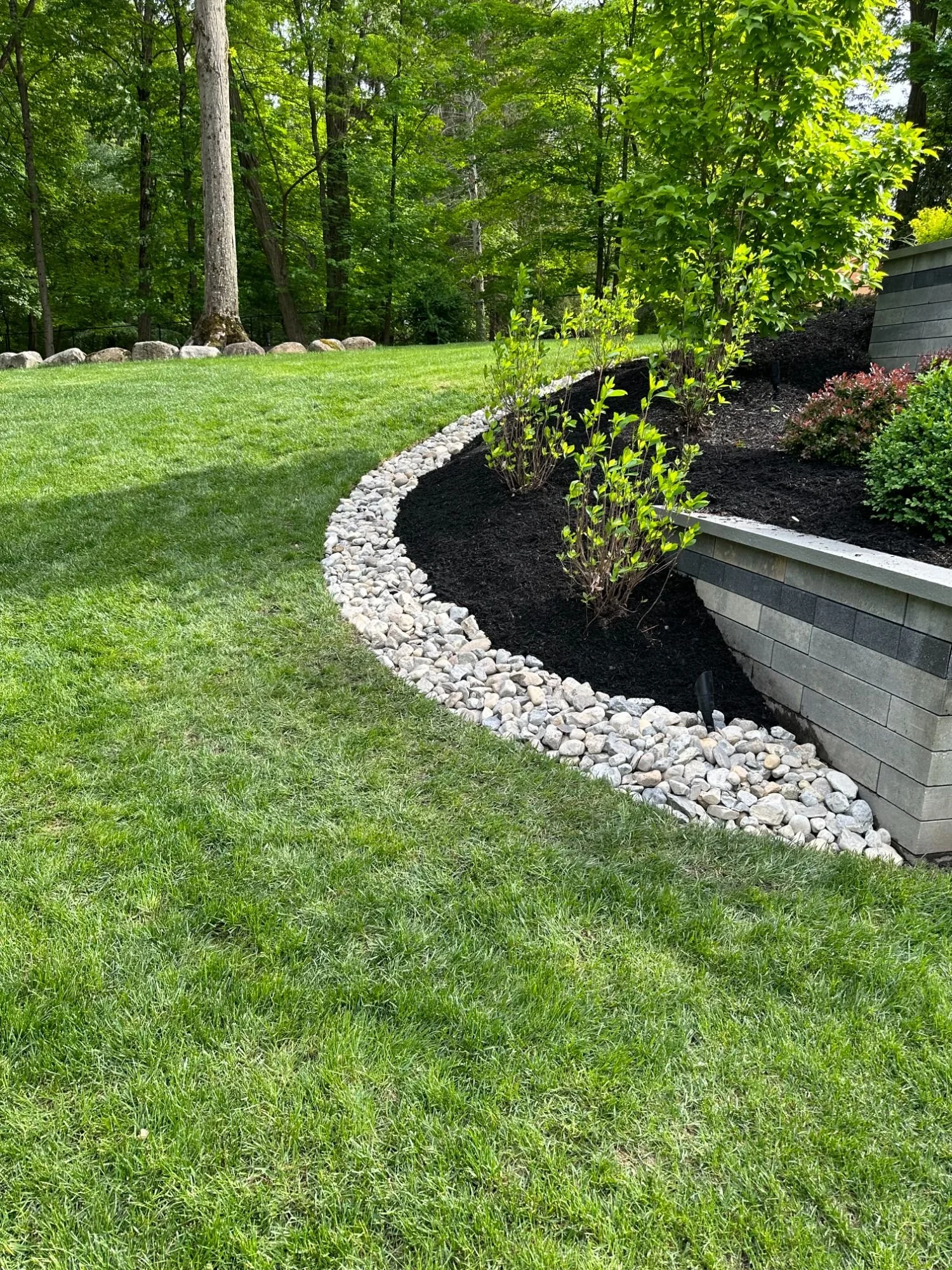 Foundation protection system with exterior trench drain and compacted stone base in Ho-Ho-Kus, NJ