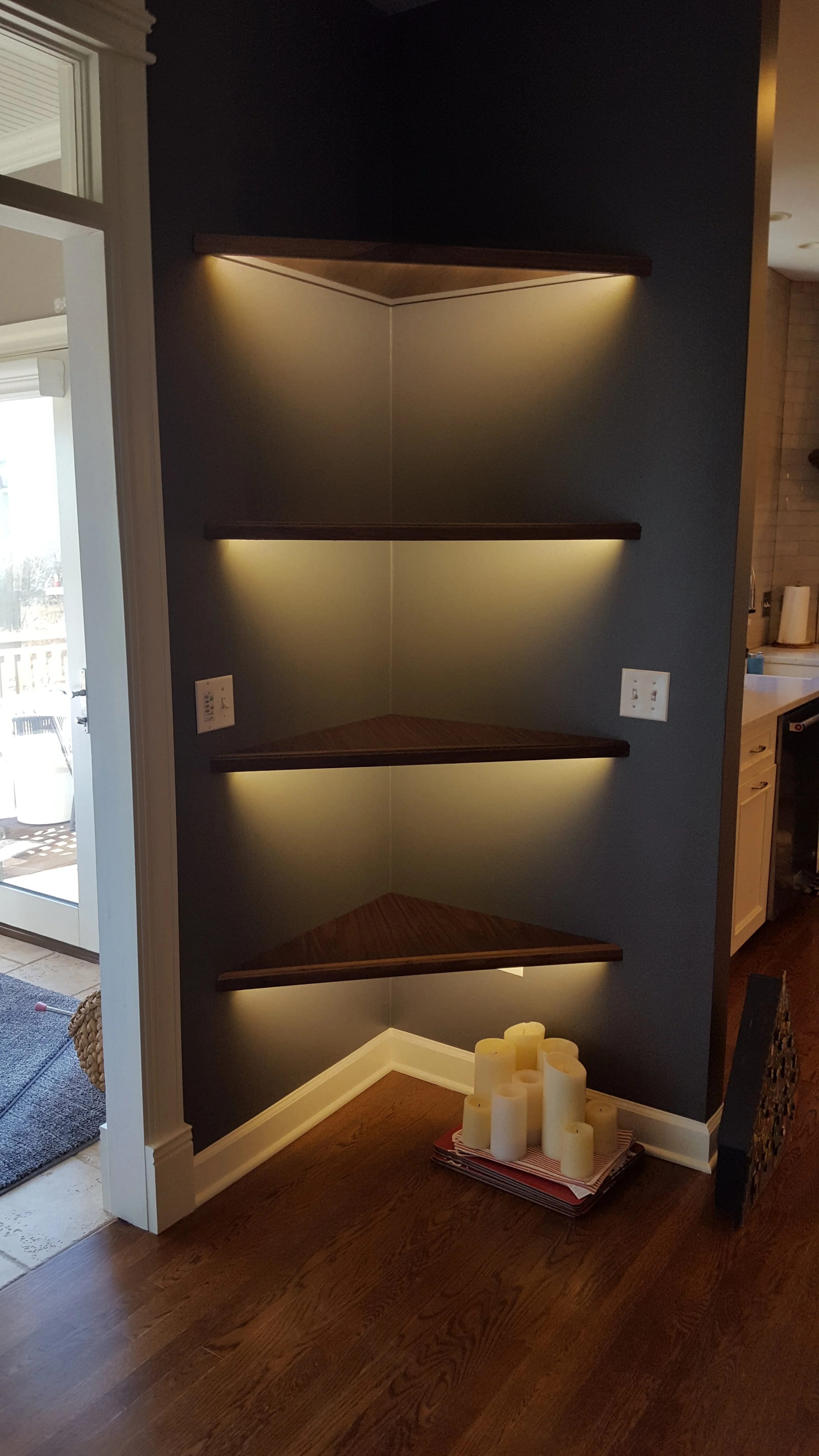 Corner wall shelves with built-in LED lighting
