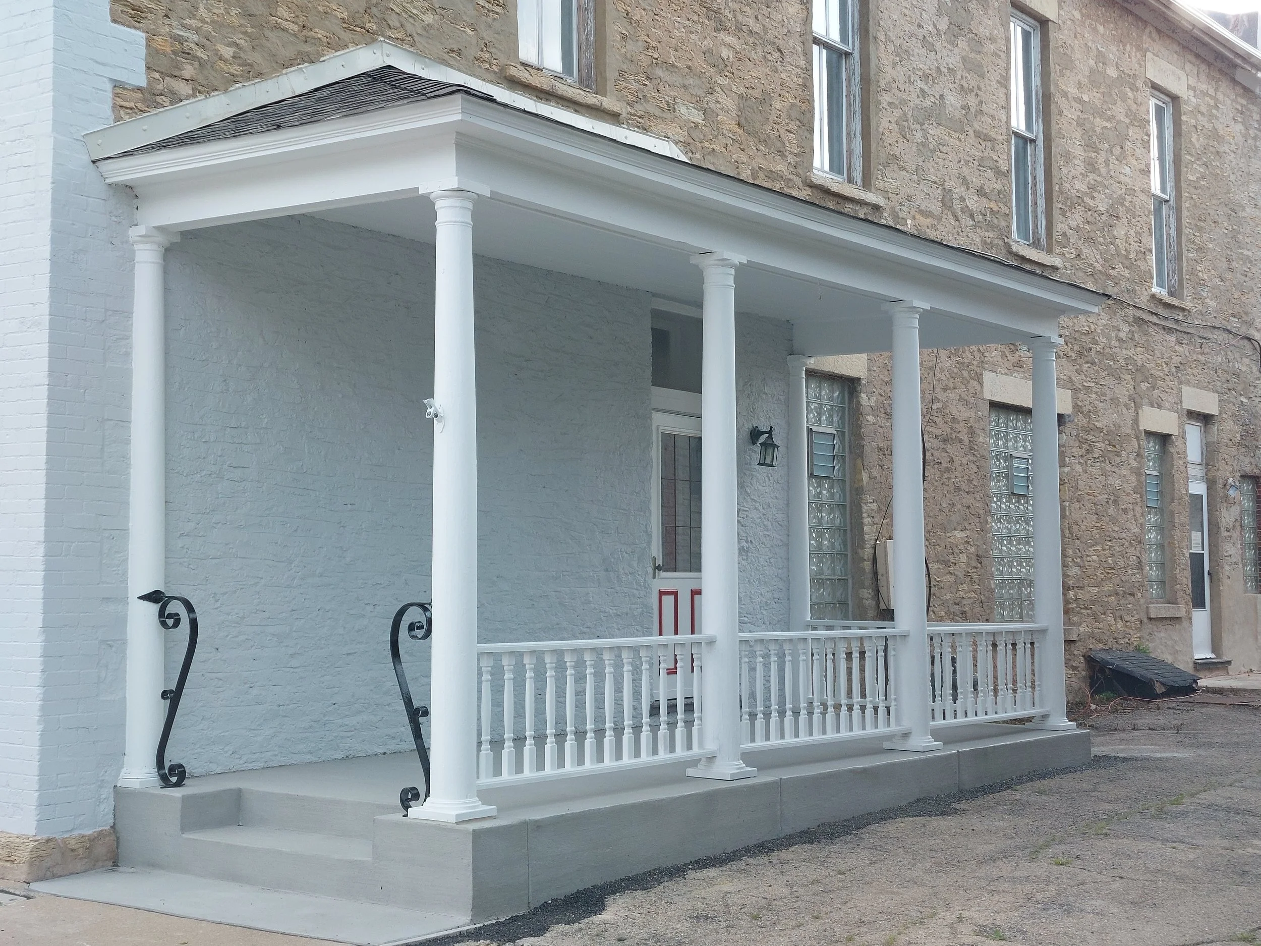 Renovated porch on historic building