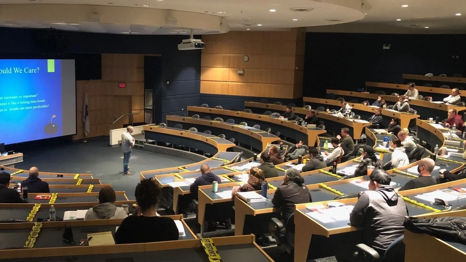 Professional Crisis Intervention trainer teaching a De-escalation Seminar