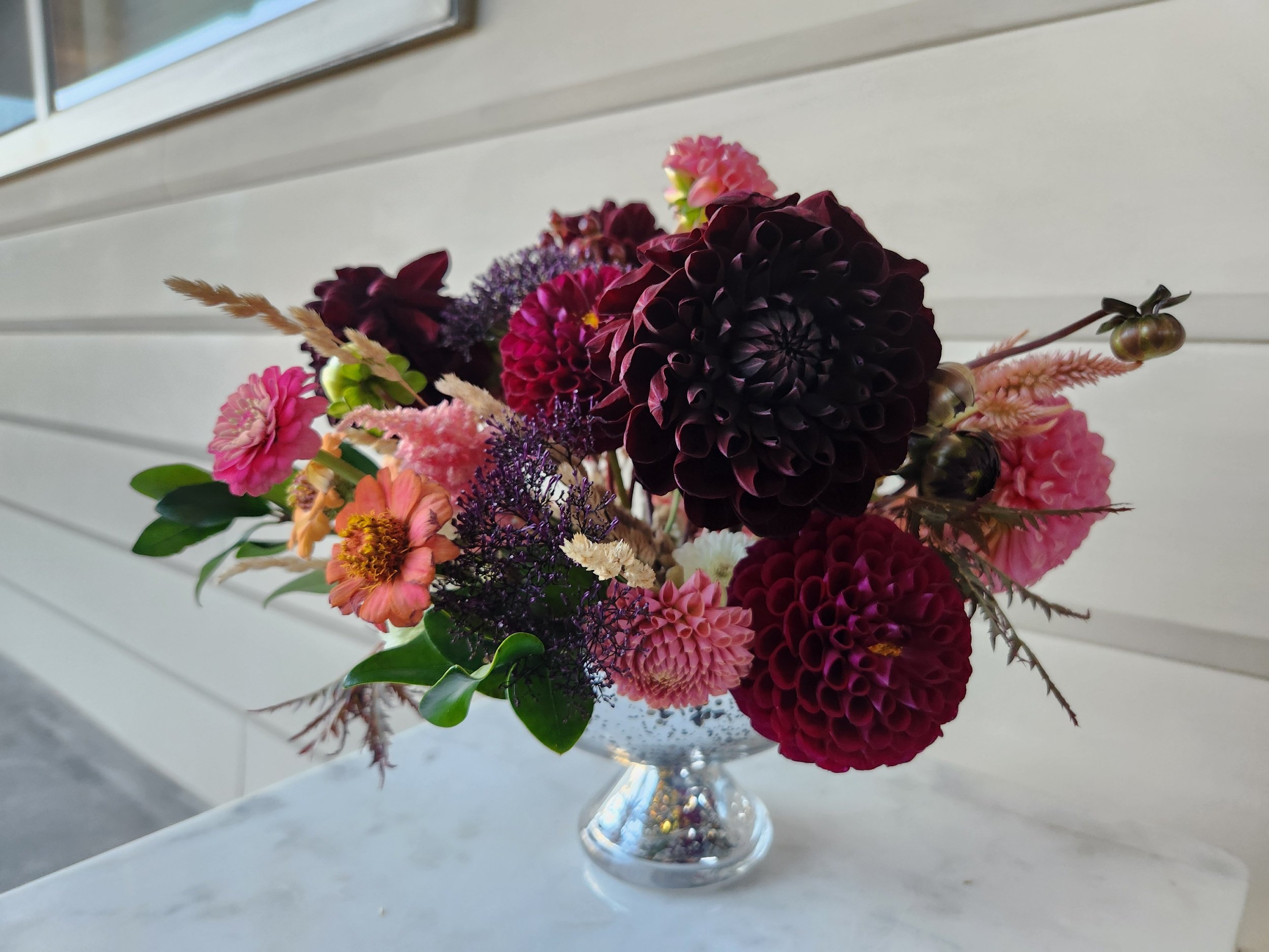 Seasonal floral arrangement (vase)
