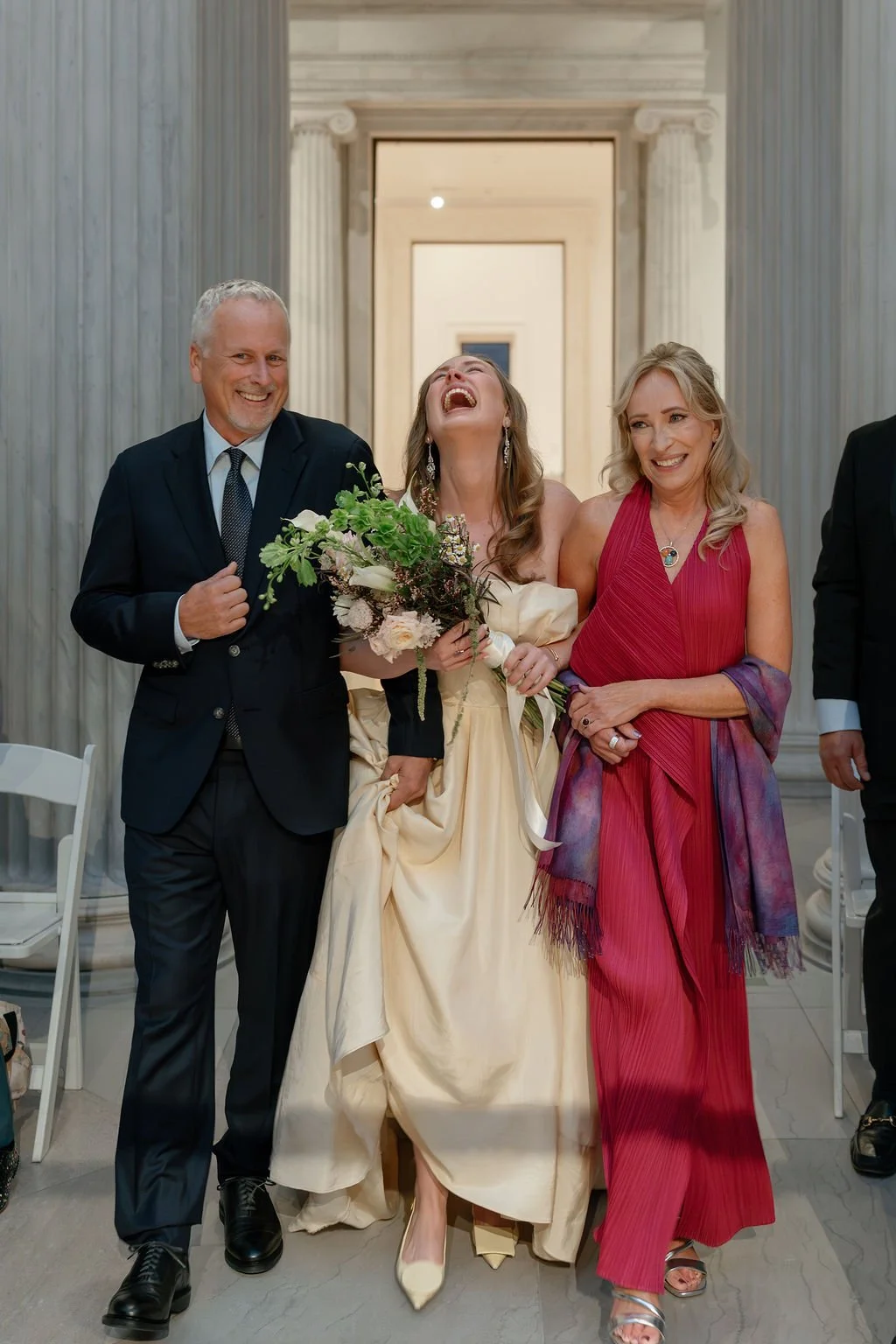 bride-walking-down-asile-art-museum-wedding.jpg