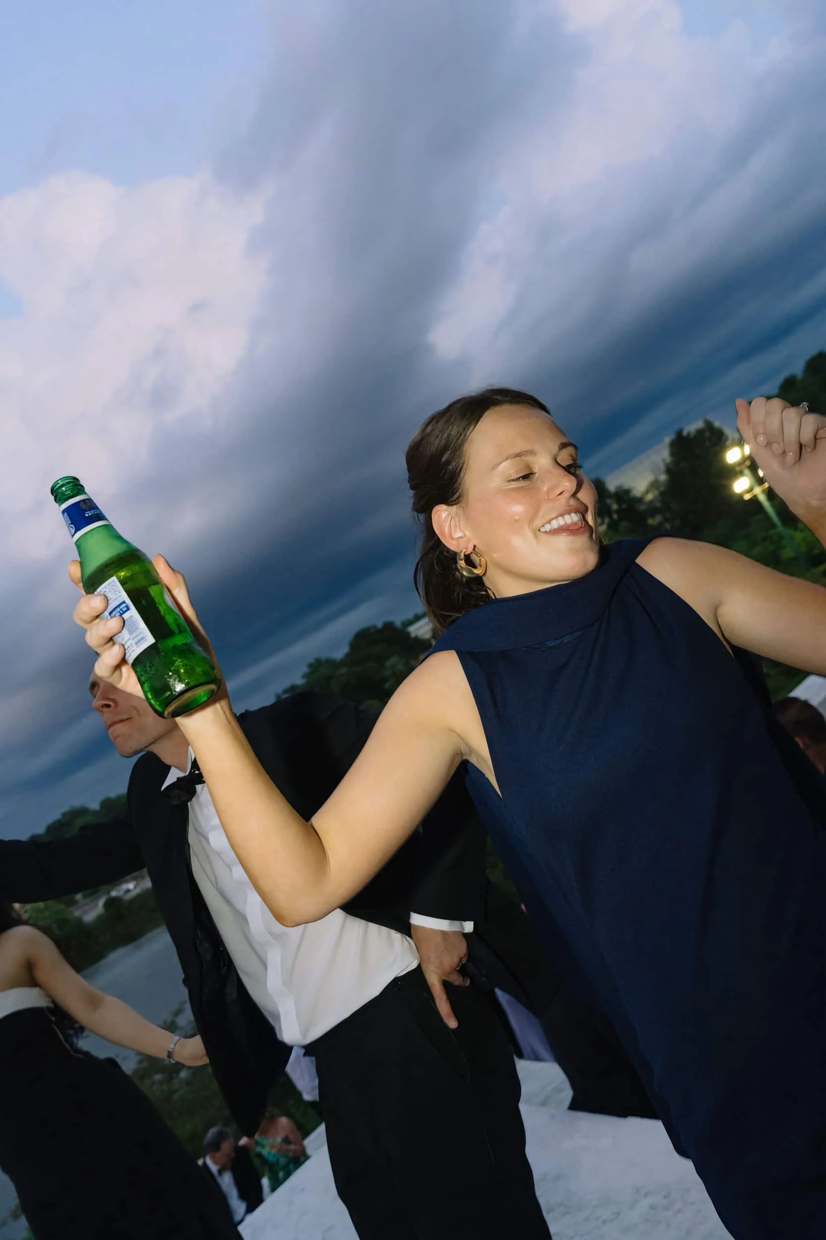 A guest dancing at the reception