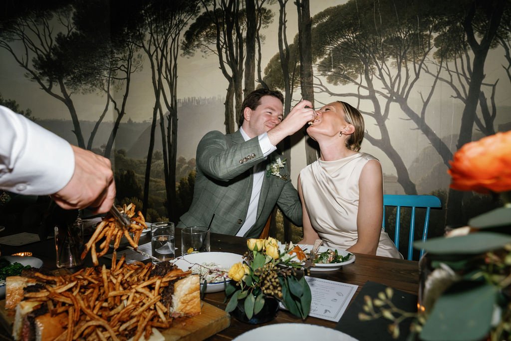 wedding-couple-eating-reception.jpg