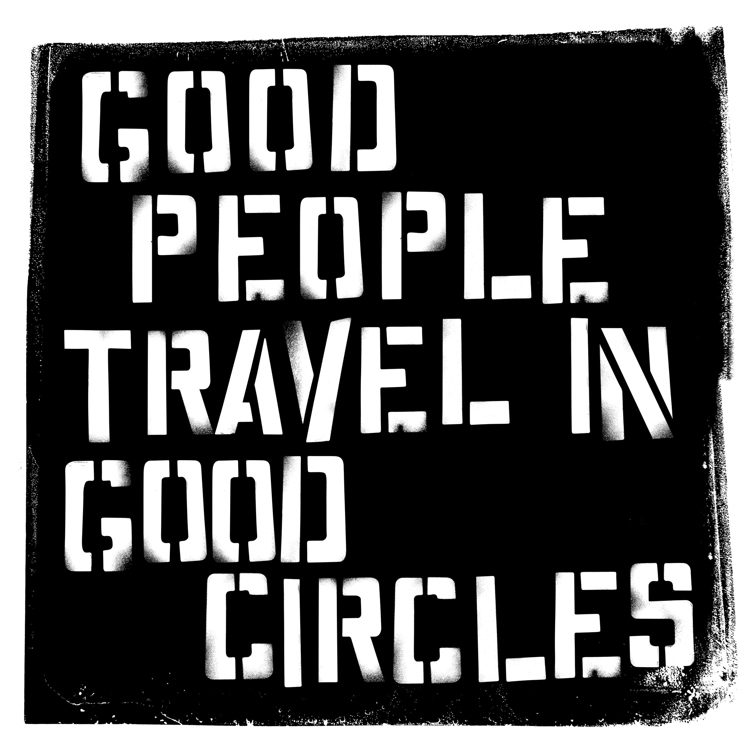 Stencil-style sign that reads 'Good People Travel in Circles' with black background and white reversed letters.