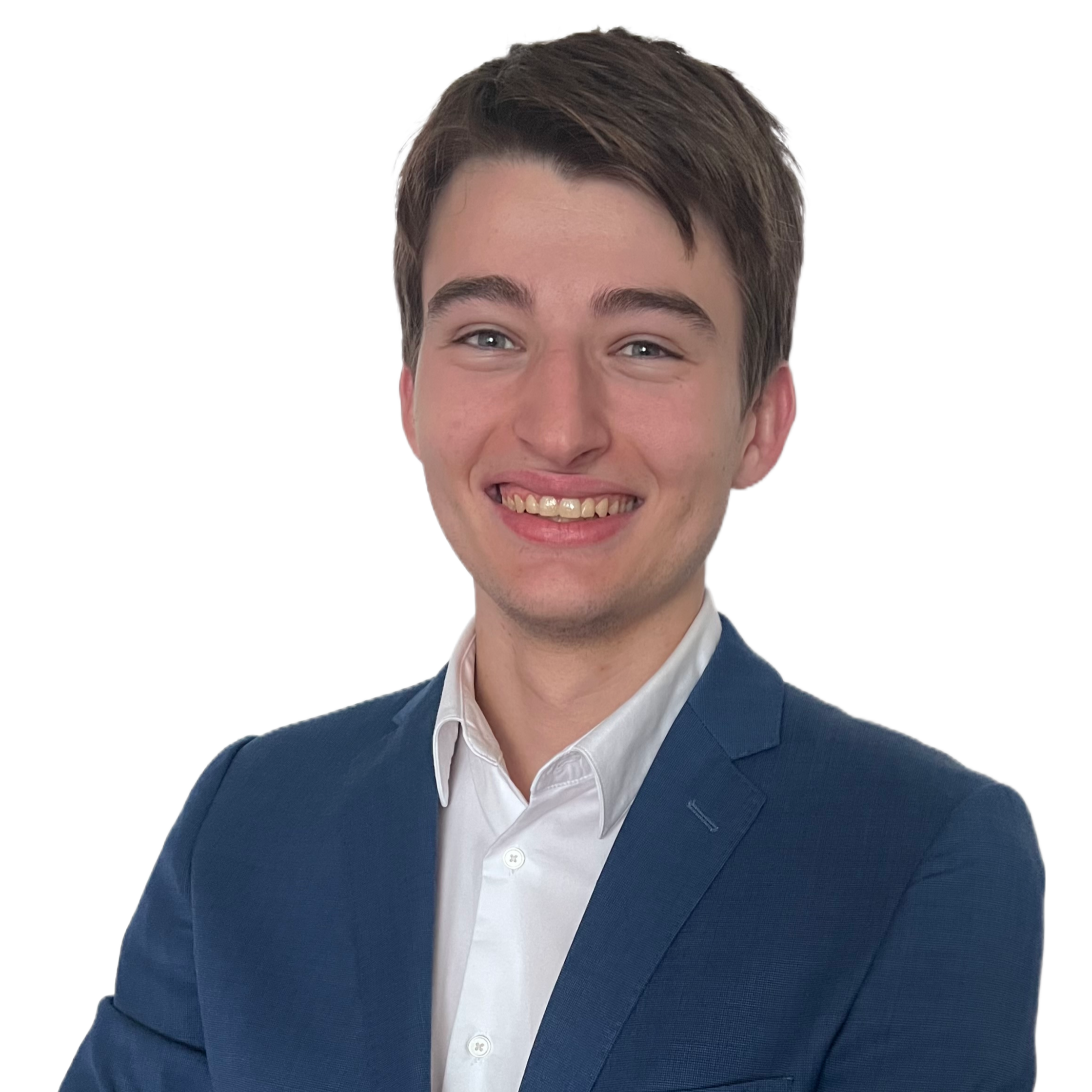 Headshot of a young man in a business suit smiling against a white background.