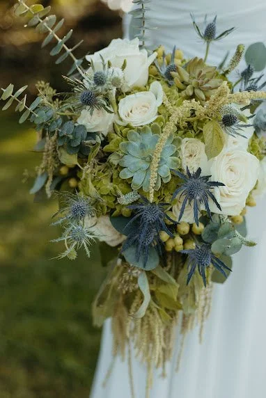 white, sage and dusty blue wedding bouquet