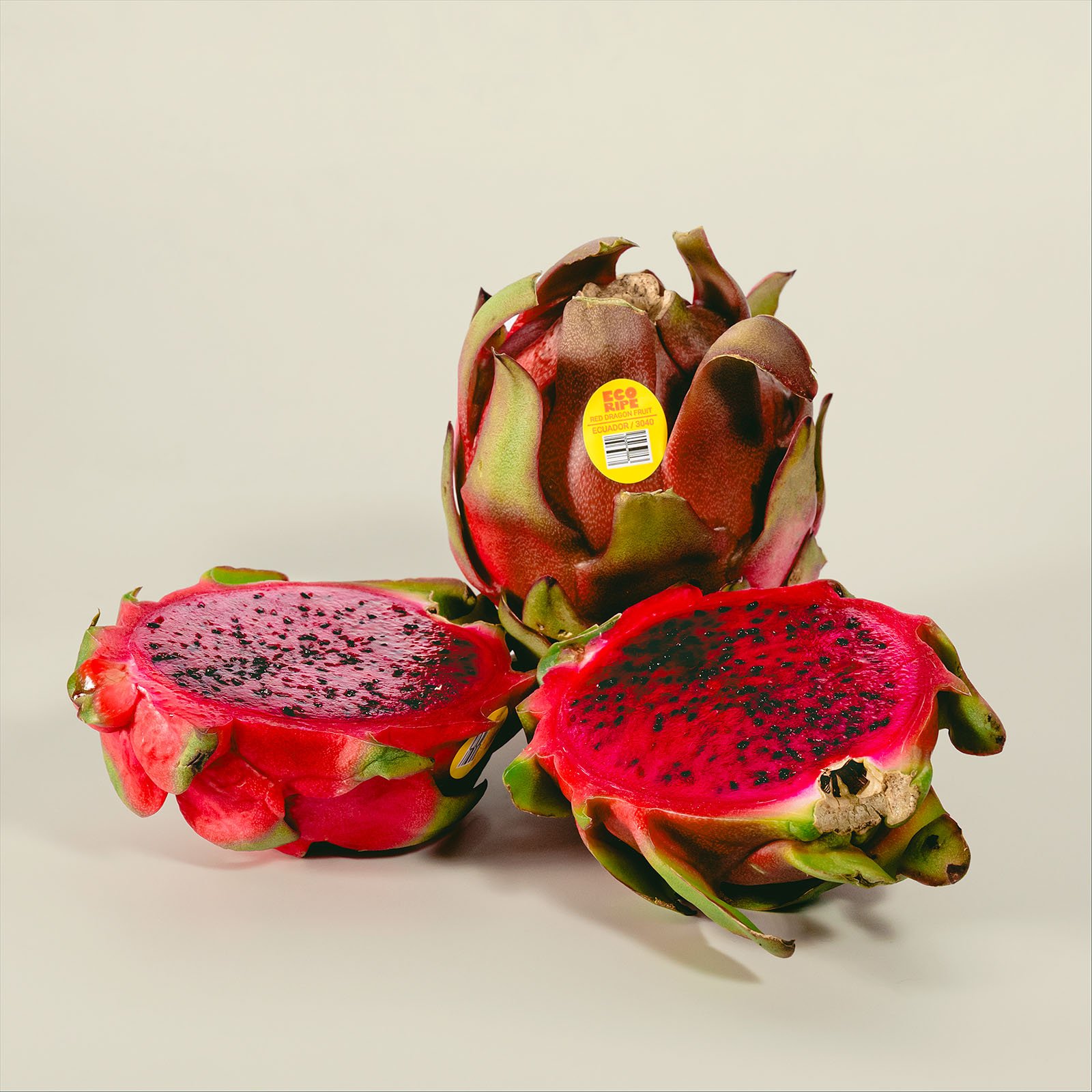 Red flesh dragon fruit halved, vibrant magenta pitahaya, fresh tropical fruit wholesale by Ecoripe Tropicals