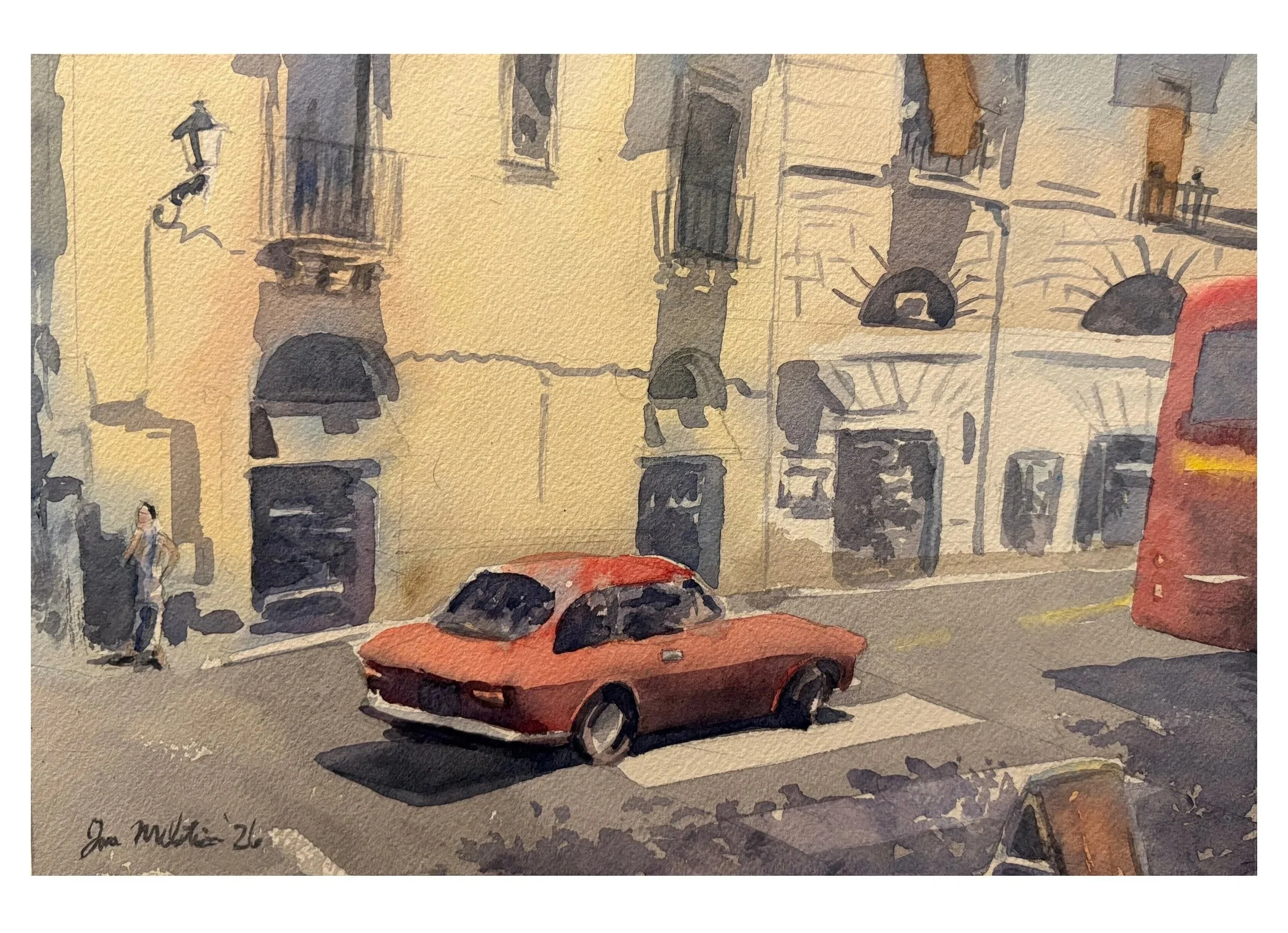 Red car and a red bus