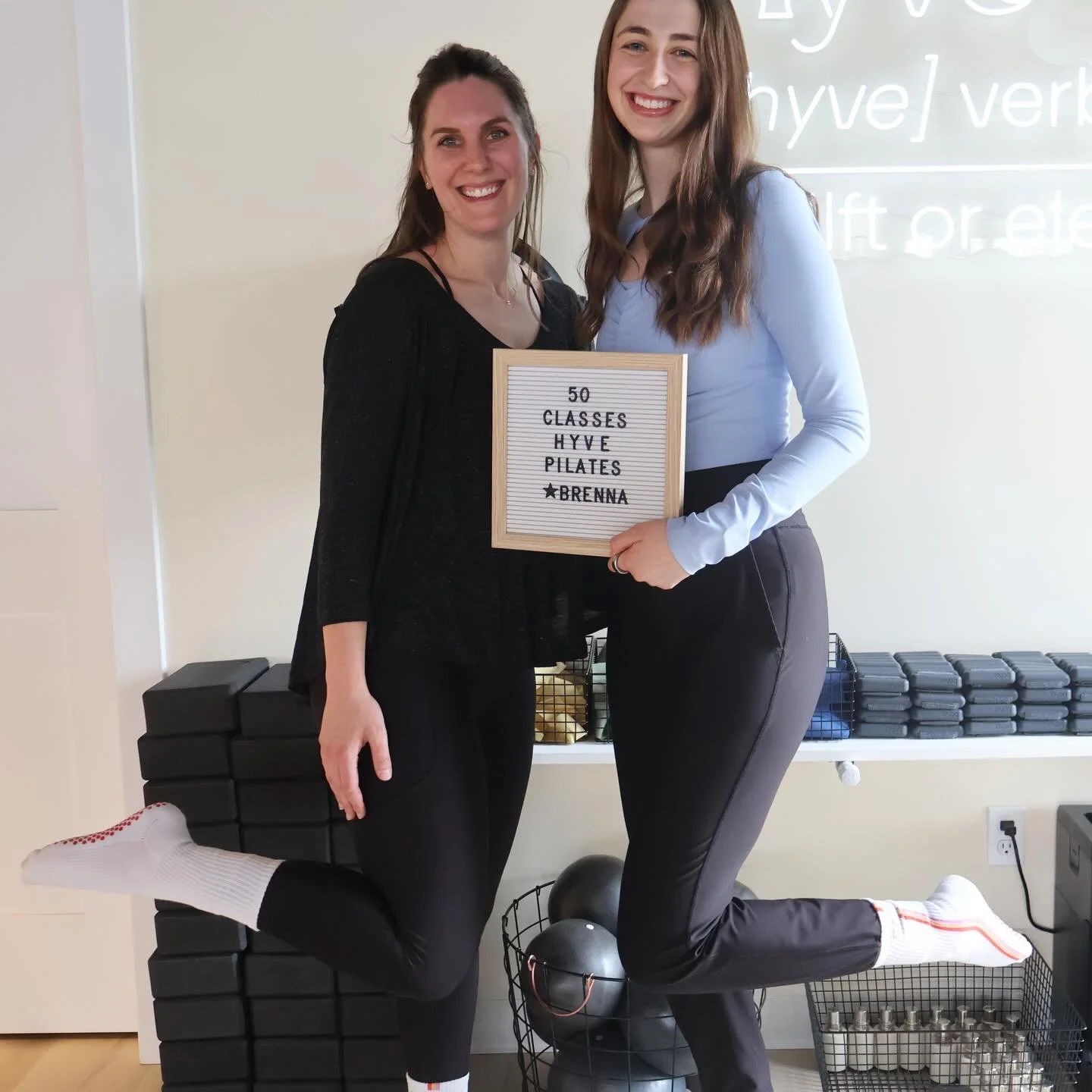 Brenna hit 50 but her head didn&rsquo;t make the guest list for the celebration pic. Tall girl problems. Matching socks with Jen, strong every class &amp; just getting started. Congrats!