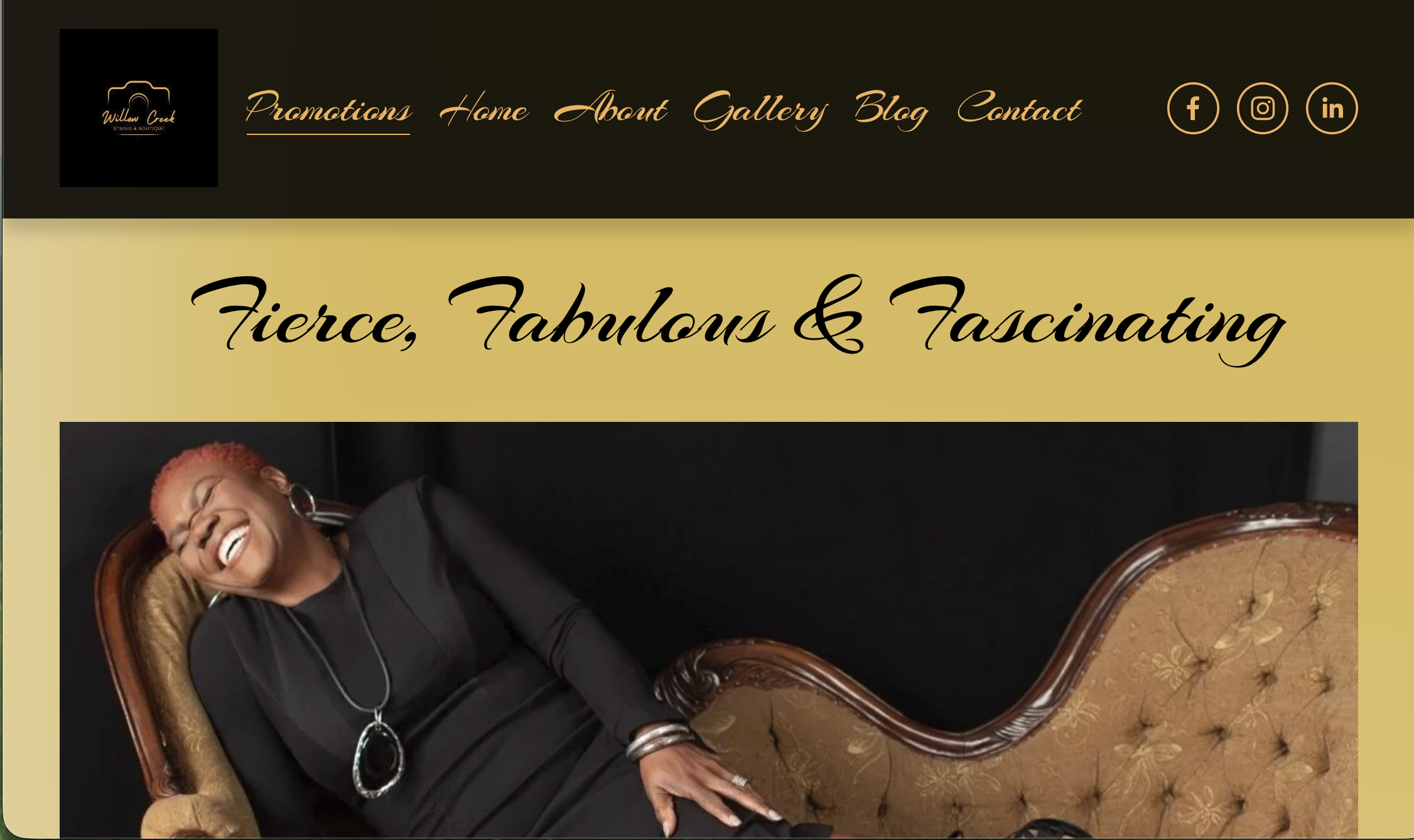 Screenshot of Willow Creek Studio & Boutique website homepage. The page has a light cream background, with a logo of a camera outline and the text 'Willow Creek Studio & Boutique' in the top left. Navigation menu items 'Home,' 'About,' 'Gallery,' 'Blog,' and 'Contact' are at the top. To the right, social media icons for Facebook, Instagram, and LinkedIn are displayed. The main text area features a large, elegant headline: 'A Portrait To A Love Letter Created Especially For You,' with a photo of a woman with dark hair, wearing a purple jacket, smiling, and resting her chin on her hand, partially visible in a circular frame on the right. There is also a smaller circular photo of a woman with curly hair and a beige outfit, seen from the back with arms raised, near the larger photo.