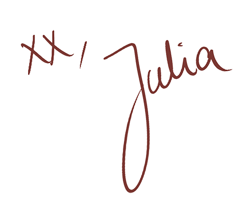 Un handschriftlicher Text mit den Worten 'Hi Julia' auf schwarzem Hintergrund.