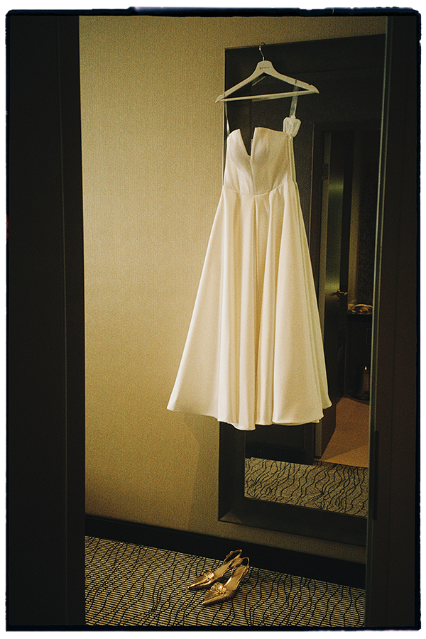 Wedding details with the bridal dress on 35mm film