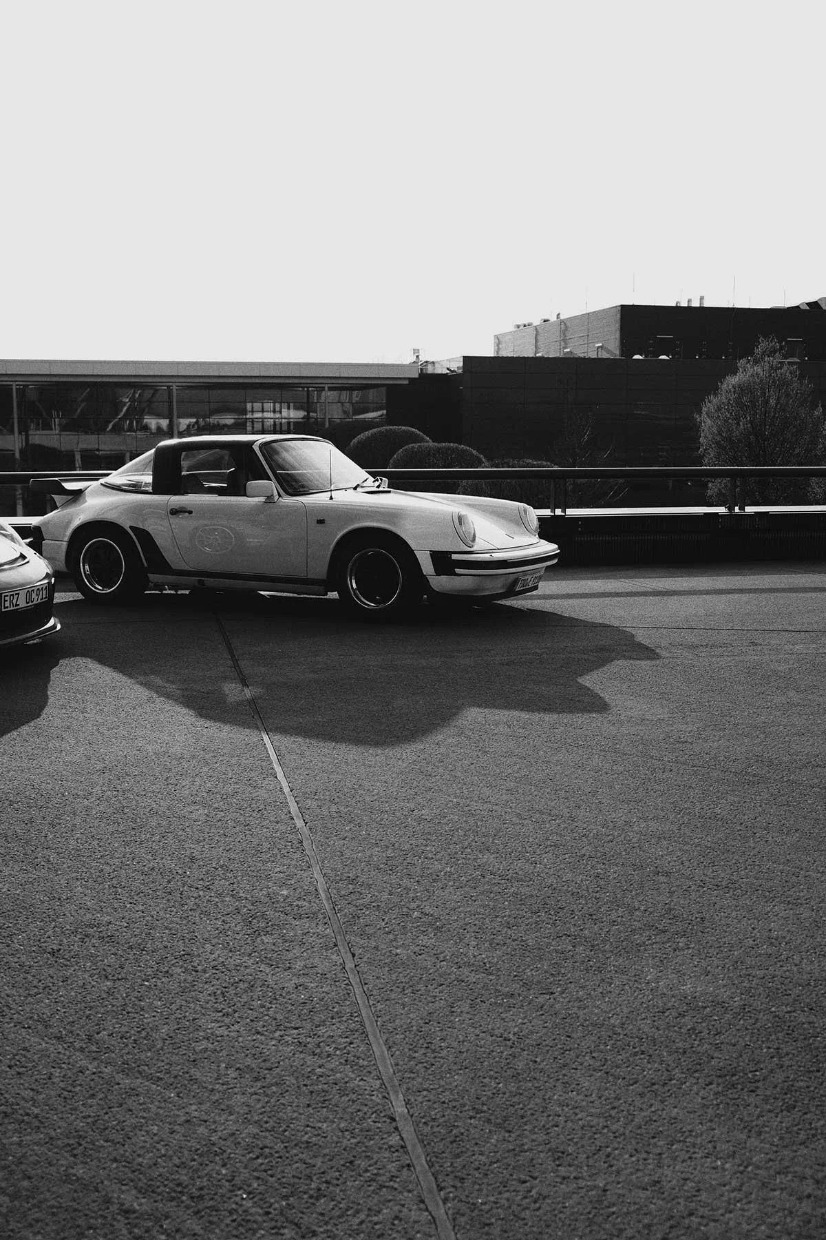 black and white photo of a porsche 911