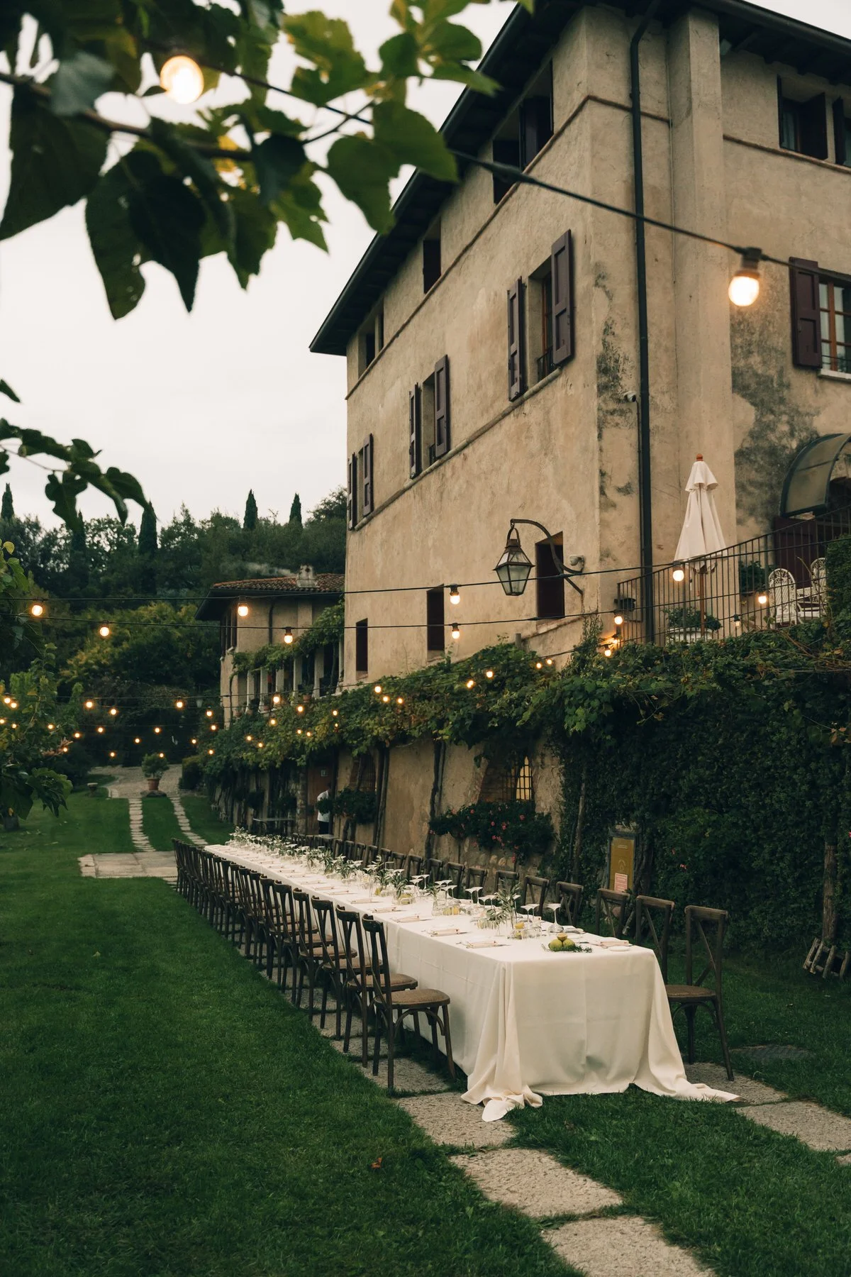 Wedding table setting in the garden at Lake Garda in Italy
