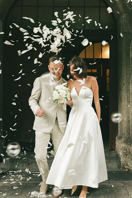 bride and groom get celebrated after civil ceremony in Leipzig