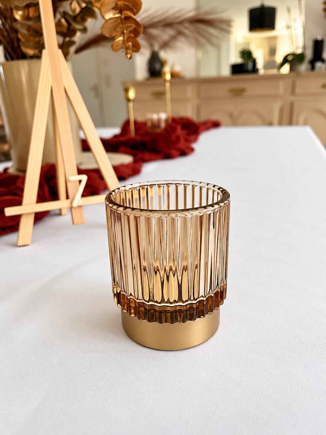 Photophore en verre strié ambré avec socle doré