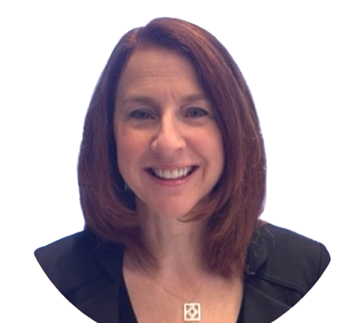 A woman with shoulder-length reddish-brown hair smiling at the camera, wearing a black top and a small necklace.