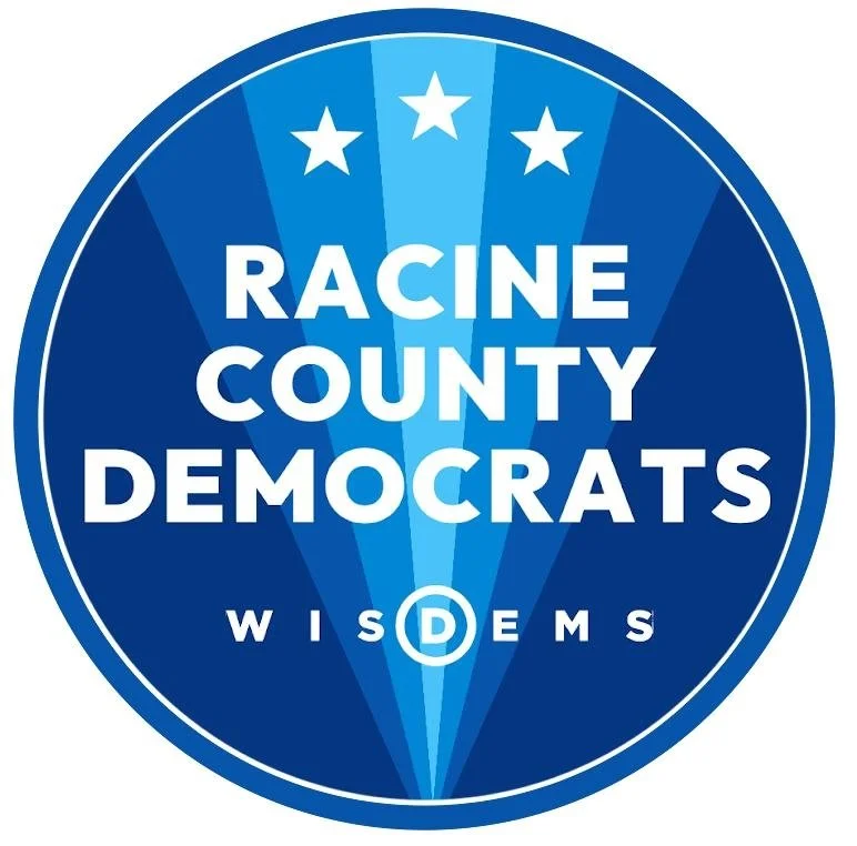 A circular emblem with blue and white colors representing Racine County Democrats, featuring stars and the word 'WisDems' at the bottom.
