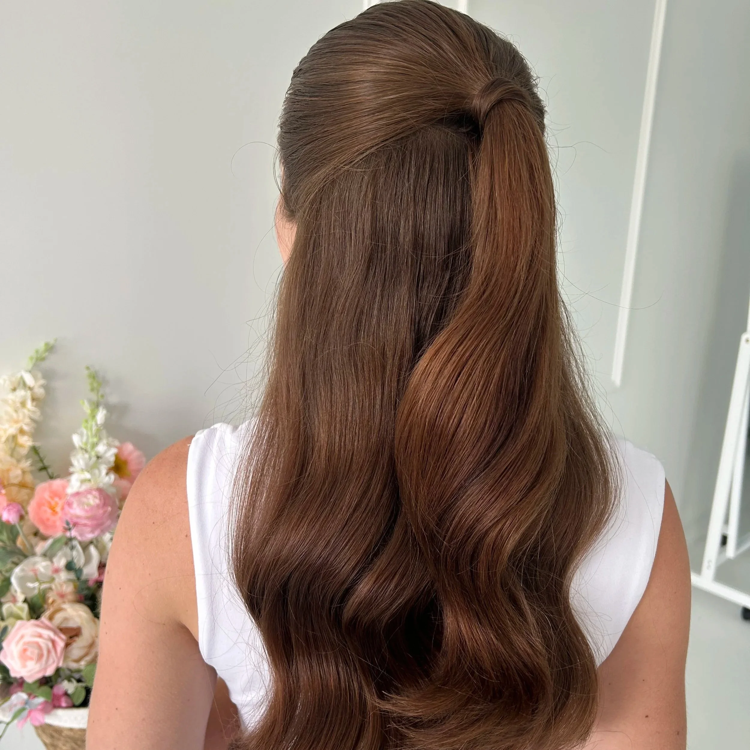 Romantic half-up half-down bridal hairstyle, soft waves