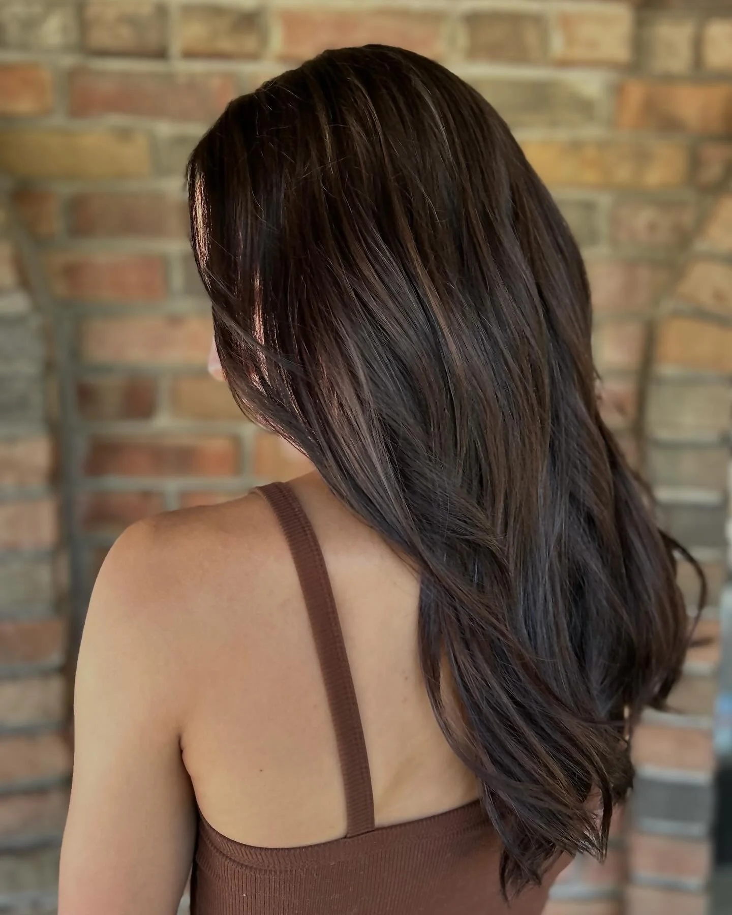 Espresso tini, anyone? 🍸🤎

&bull;

We toned her existing highlights down and enhanced her natural color, keeping her dark but dimensional 🤎

#michiganhairstylist #aveda #avedaartist