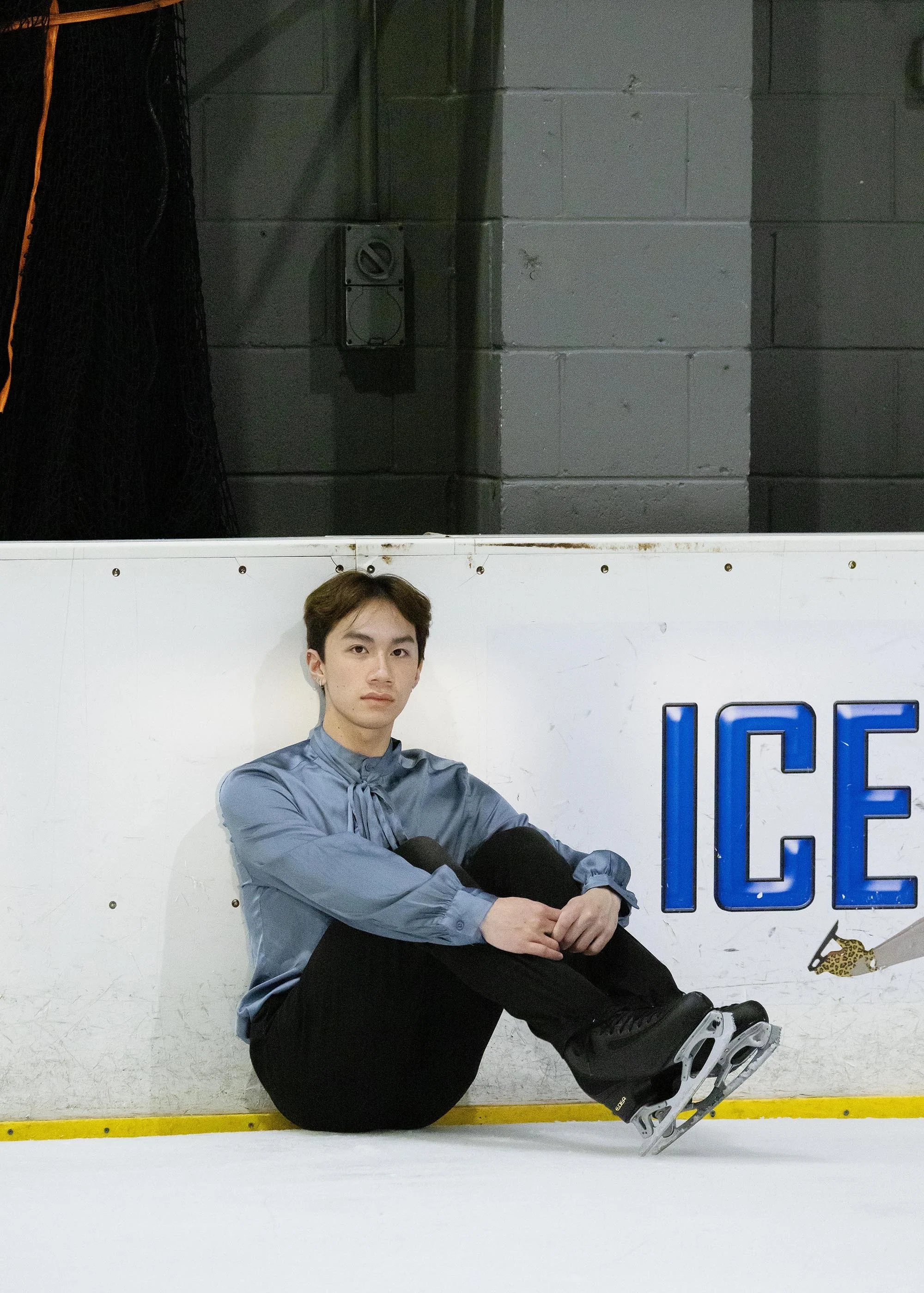 Emery Kaison sitting on the ice from the Daily Telegraph.