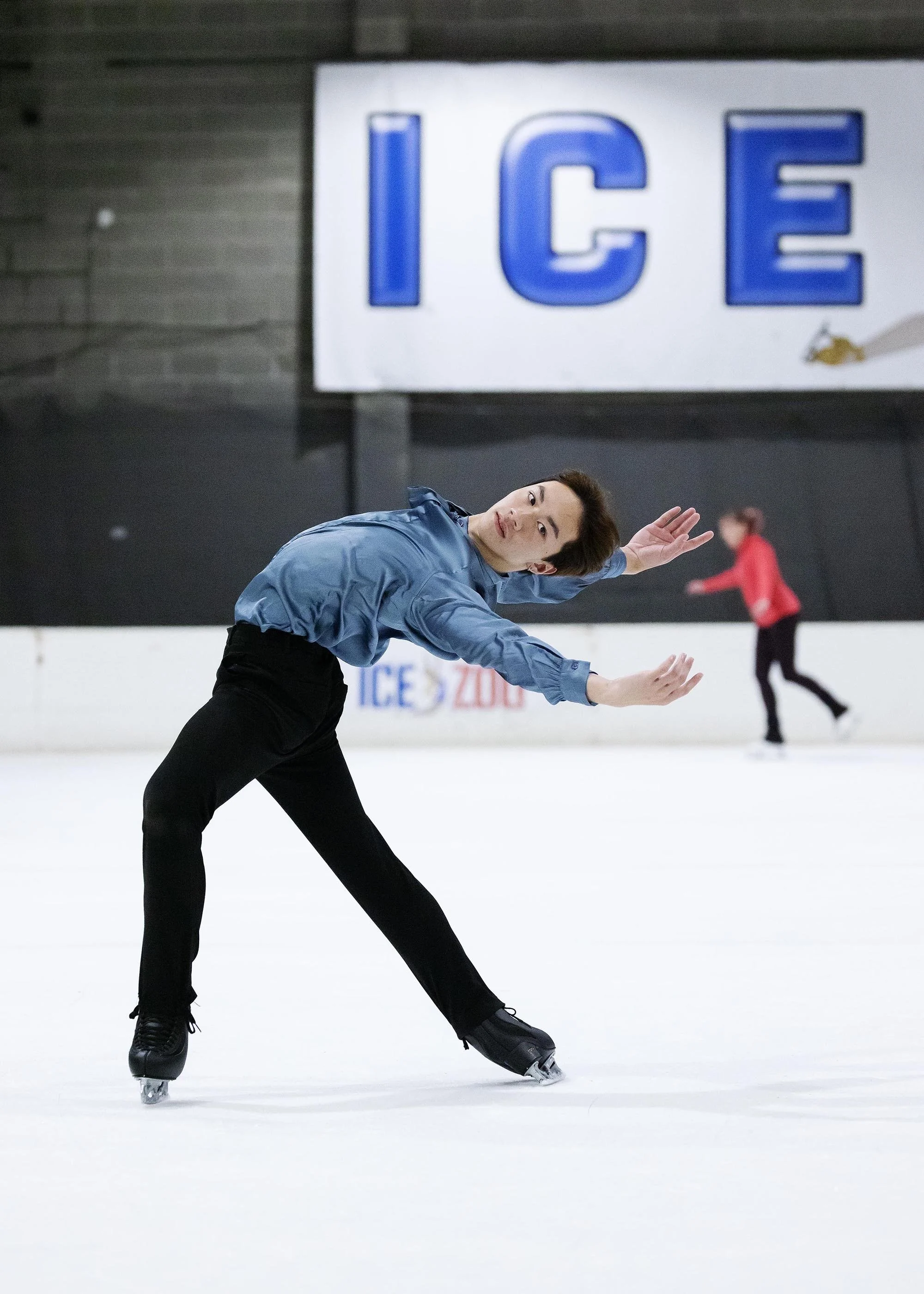 Emery Kaison performing an Ina Bauer on the ice from the Daily Telegraph.
