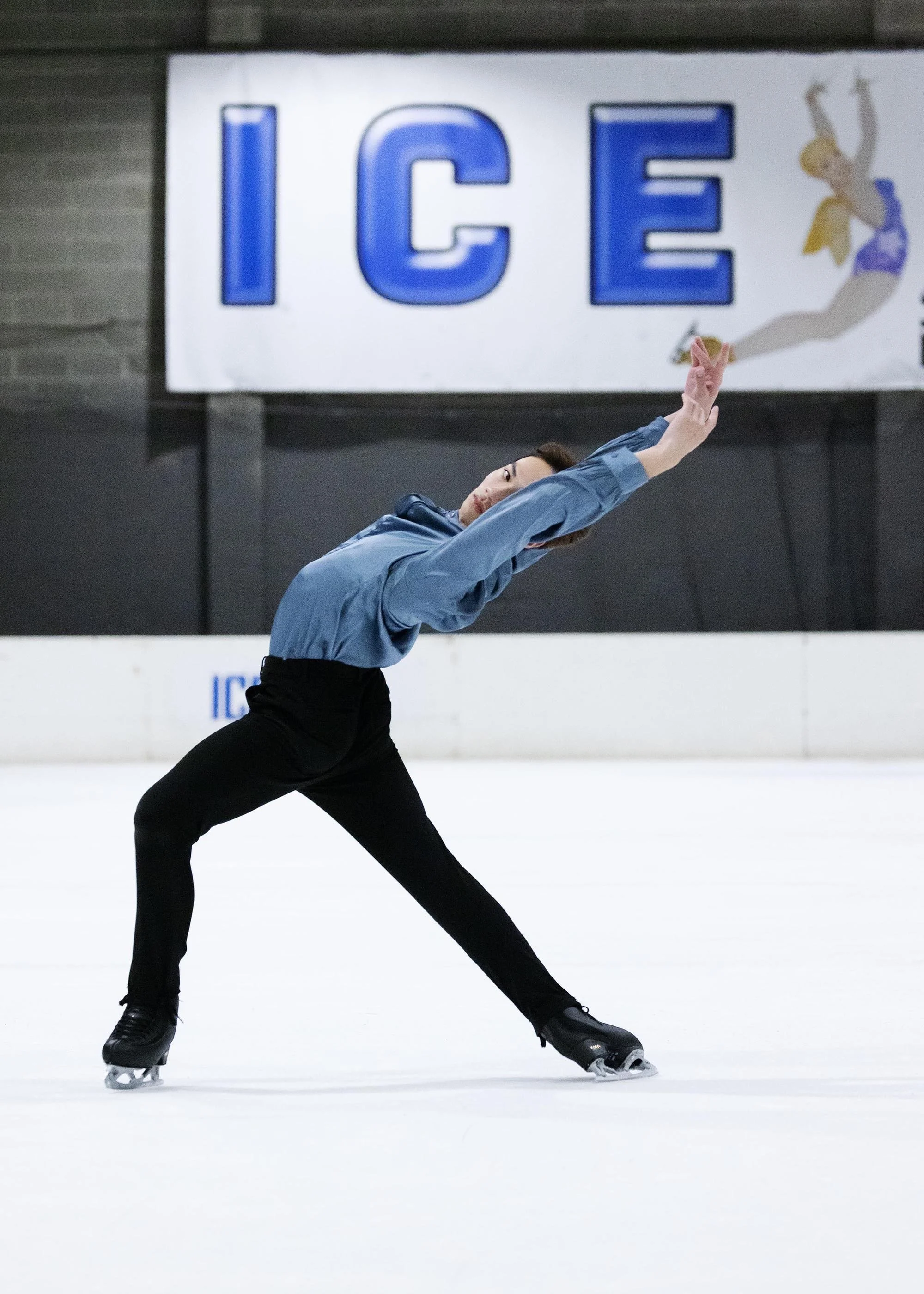 Emery Kaison performing an Ina Bauer on the ice from the Daily Telegraph.