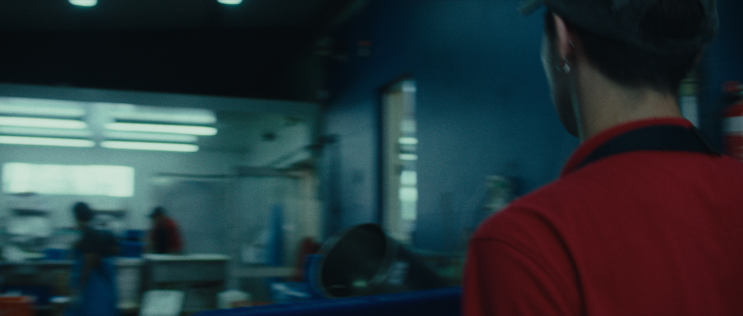 Emery Kaison working in Sydney Fish Markets in I'll Be There For You music video.