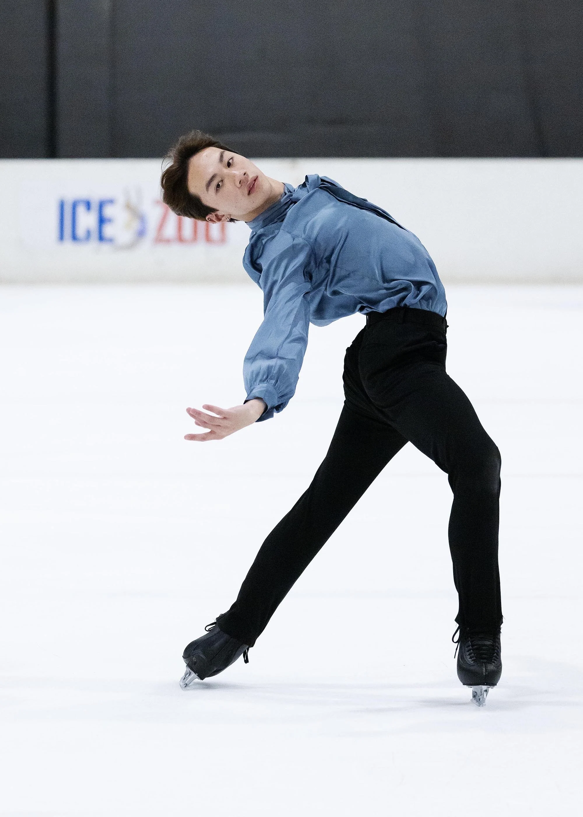 Emery Kaison performing an Ina Bauer on the ice from the Daily Telegraph.